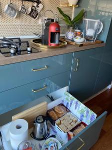a box of food sitting on top of a kitchen counter at B&B il Duca d'Amalfi in Salerno