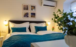 Postel nebo postele na pokoji v ubytování Luxury Lifestyle Rooms