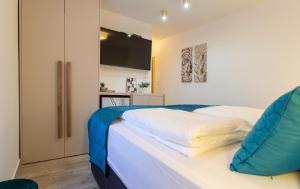 Postel nebo postele na pokoji v ubytování Luxury Lifestyle Rooms