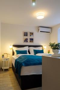 Postel nebo postele na pokoji v ubytování Luxury Lifestyle Rooms