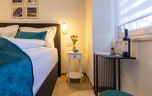 Postel nebo postele na pokoji v ubytování Luxury Lifestyle Rooms