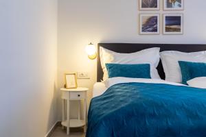 Postel nebo postele na pokoji v ubytování Luxury Lifestyle Rooms