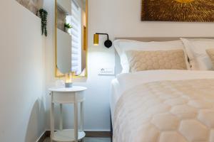 Postel nebo postele na pokoji v ubytování Luxury Lifestyle Rooms