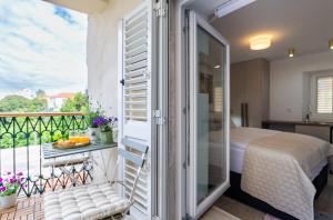 Postel nebo postele na pokoji v ubytování Luxury Lifestyle Rooms