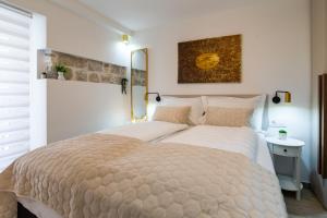 Postel nebo postele na pokoji v ubytování Luxury Lifestyle Rooms