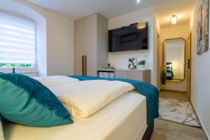 TV a/nebo společenská místnost v ubytování Luxury Lifestyle Rooms