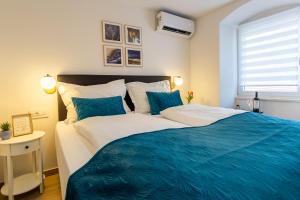 Postel nebo postele na pokoji v ubytování Luxury Lifestyle Rooms