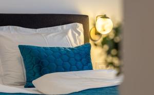 Postel nebo postele na pokoji v ubytování Luxury Lifestyle Rooms