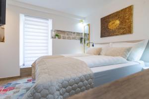 Postel nebo postele na pokoji v ubytování Luxury Lifestyle Rooms