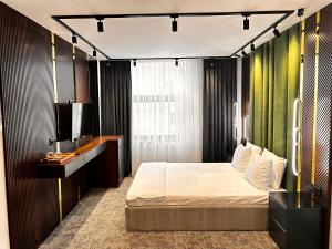 Postel nebo postele na pokoji v ubytování zeytin hotel