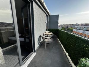 En balkong eller terrasse på Best House Hotel