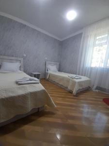 Postel nebo postele na pokoji v ubytování HOTEL LukaRabati