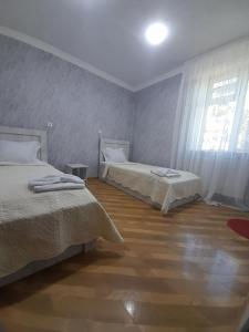 Voodi või voodid majutusasutuse HOTEL LukaRabati toas
