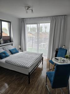 Postel nebo postele na pokoji v ubytování Sunset Beach