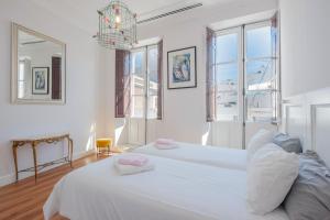 Postel nebo postele na pokoji v ubytování Casa Verde Ayamonte
