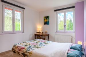 Postel nebo postele na pokoji v ubytování Gîte La Ramée
