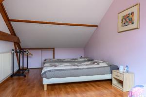 Postel nebo postele na pokoji v ubytování Gîte La Ramée