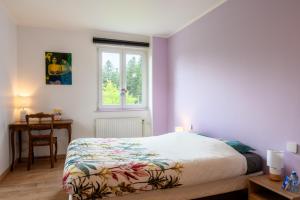 Postel nebo postele na pokoji v ubytování Gîte La Ramée
