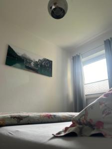 Voodi või voodid majutusasutuse Ferienwohnung Bärenblick Achensee toas