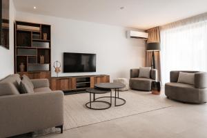 Blue Bay Curaçao Golf & Beach Resortにあるテレビまたはエンターテインメントセンター