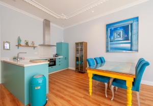 Kuchyň nebo kuchyňský kout v ubytování Casa Verde Ayamonte