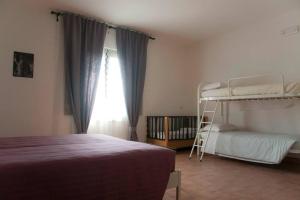 Ένα ή περισσότερα κρεβάτια σε δωμάτιο στο Agriturismo Il Moro +100 φωτογραφίες