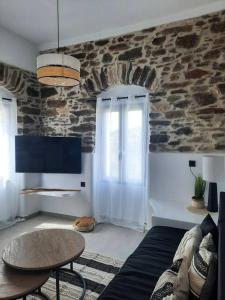 TV a/nebo společenská místnost v ubytování RIVER STONE Home