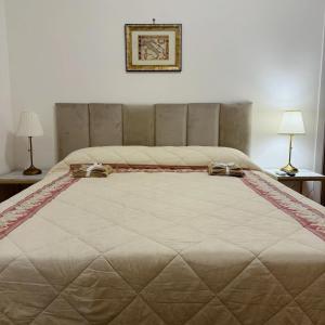 Postel nebo postele na pokoji v ubytování B&B La Meta