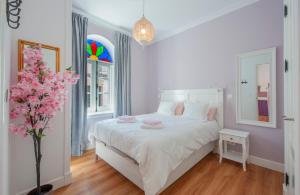 Postel nebo postele na pokoji v ubytování Casa Verde Ayamonte