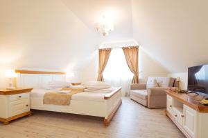 Postel nebo postele na pokoji v ubytování Green Garden Avrig + 93 fotografií