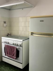 Ett kök eller pentry på Appartamento 1962 - con parcheggio privato gratuito