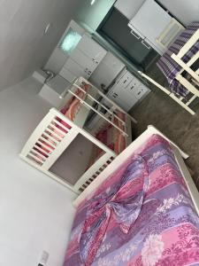 Ένα ή περισσότερα κρεβάτια σε δωμάτιο στο TheCozyView2