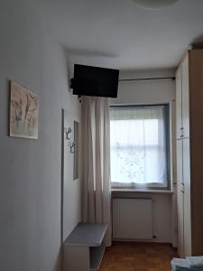 TV a/nebo společenská místnost v ubytování B&B DA ROBERTINO
