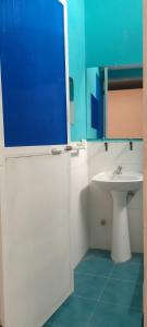 Ett badrum på Hostal La GRAN Familia