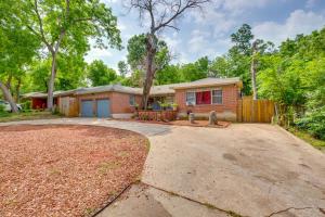 a house with a driveway in front of it at 7 Mi to Downtown Dallas WFH-Friendly Studio in Dallas