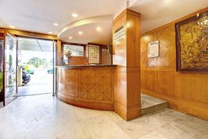 a lobby of a building with a ticket counter at Hotel O Star Ldh in Ludhiana