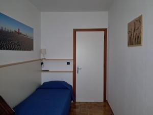 Postel nebo postele na pokoji v ubytování B&B DA ROBERTINO