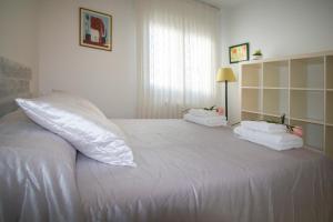 Ένα ή περισσότερα κρεβάτια σε δωμάτιο στο Villa Cotomar