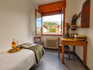Ένα ή περισσότερα κρεβάτια σε δωμάτιο στο Casa Harmony