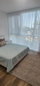 Postel nebo postele na pokoji v ubytování מול הים בקיסריה + 26 fotografií
