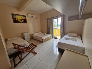 Ένα ή περισσότερα κρεβάτια σε δωμάτιο στο HOTEL E RESTAURANTE ILHA BELA +45 φωτογραφίες