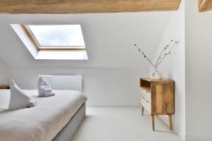 Ліжко або ліжка в номері Superbe appartement avec • Sauna • Spa • Massage