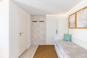 Ένα ή περισσότερα κρεβάτια σε δωμάτιο στο Ferienwohnung Kleiner Sandloper