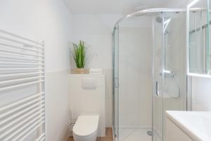 Ένα μπάνιο στο Ferienwohnung Kleiner Sandloper