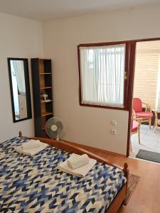 Postel nebo postele na pokoji v ubytování Apartman Vera