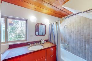 a bathroom with a sink and a shower at Casa Pinostella in Templeton +41 photos