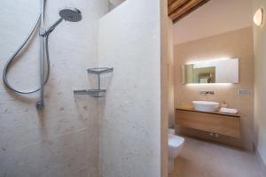 Koupelna v ubytování Casa Bachella