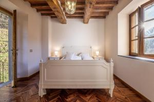 Postel nebo postele na pokoji v ubytování Casa Bachella