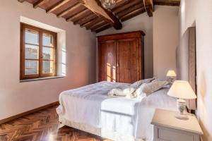 Postel nebo postele na pokoji v ubytování Casa Bachella