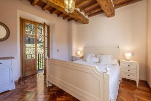 Postel nebo postele na pokoji v ubytování Casa Bachella + 37 fotografií